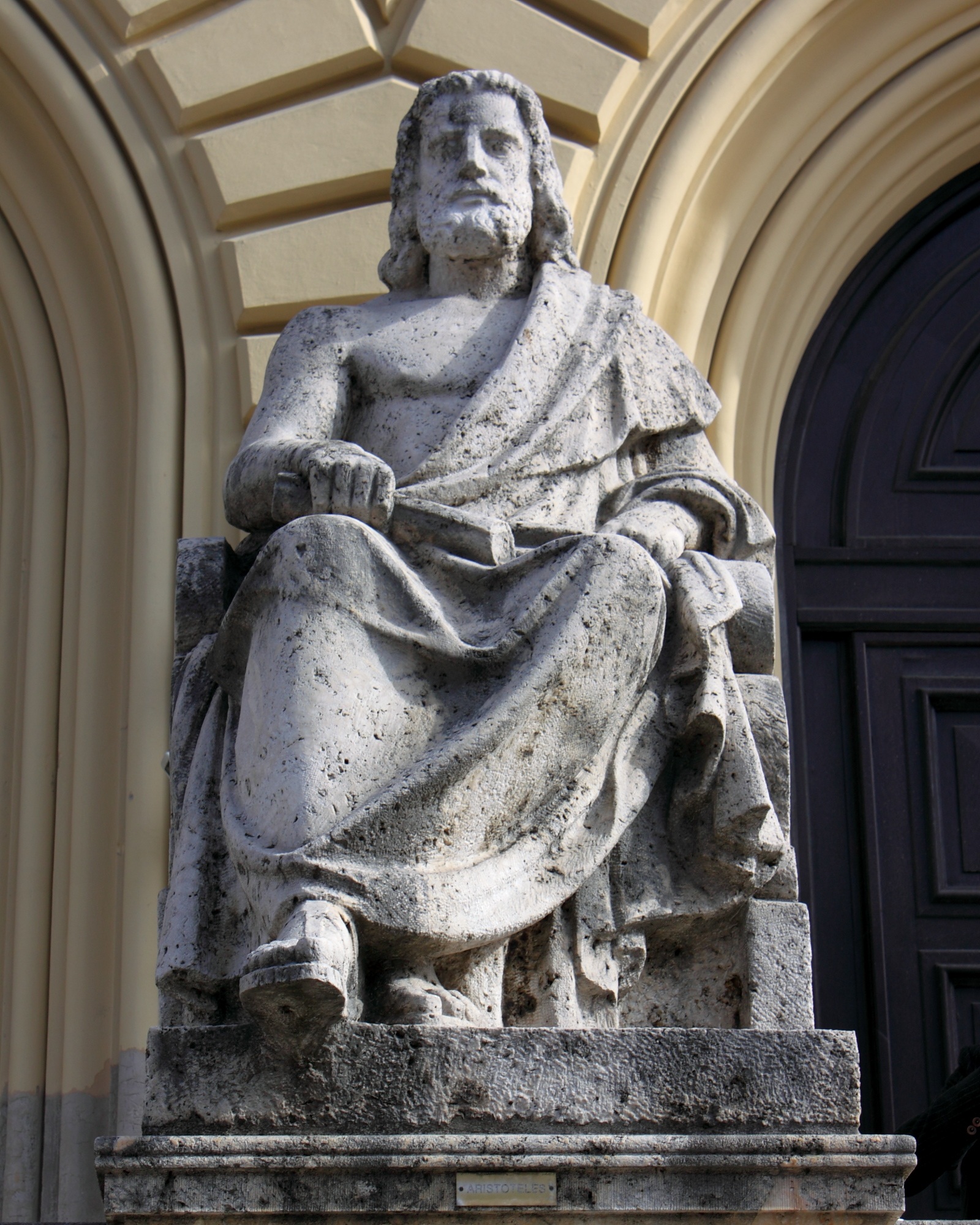 Aristotle, Aristotle was a bugger for the bottle. Statue at the entrance of the Bayerische Staatsbibliothek